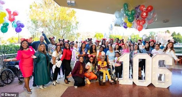 The 106-year-old, who even wore a crown, was warmly welcomed by a raucous rendition of Happy Birthday