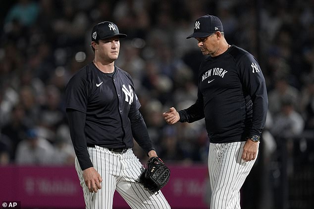 Cole reacts as he is pulled from the game by manager Aaron Boone during the first inning of a spring training game against the Blue Jays on March 1