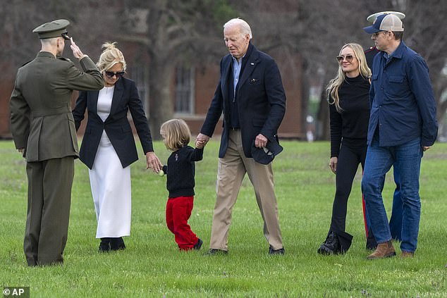 The group was all smiles as Beau carried a small Easter egg, followed by his parents Hunter Biden and Melissa Cohen