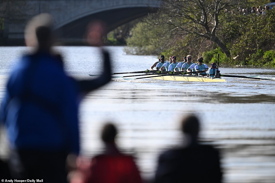 Cambridge surged to a three-and-a-half length lead in the men's race, taking victory despite a late collapse scare