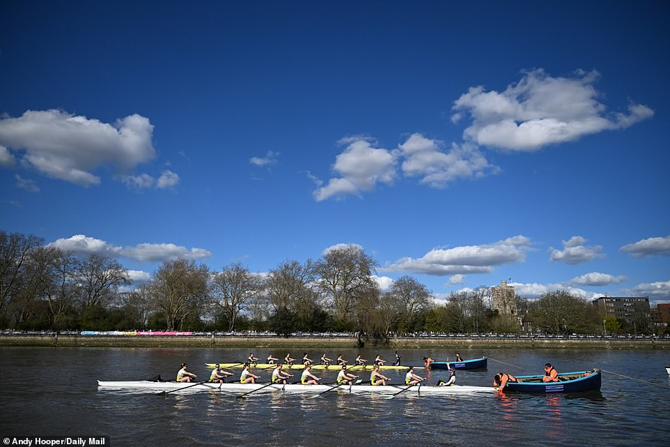 The historic race starts in Putney and finishes in Mortlake, with spectators stretching for miles along both banks of the river