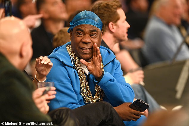 Tracy Morgan was seen at the match wearing a blue tracksuit and matching durag