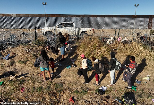 Groups of migrants of different nationalities arrive in the Rio Grande last month, to cross it and surrender to US authorities