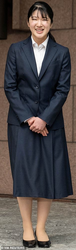 The princess is pictured outside the Red Cross building in Tokyo