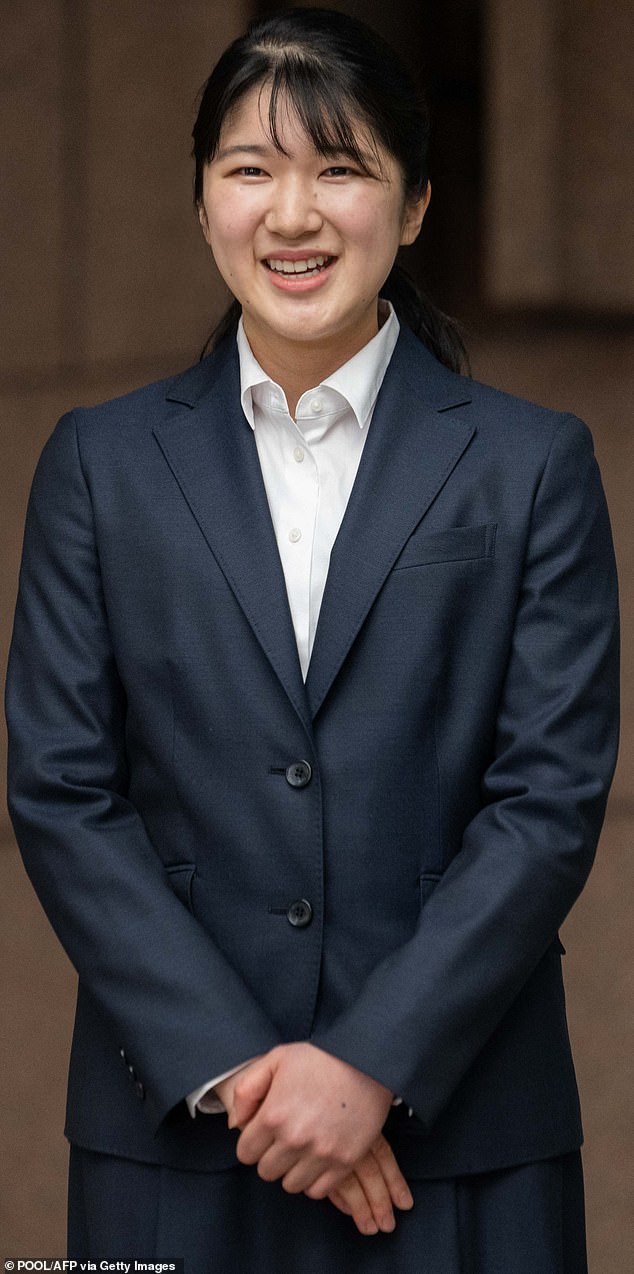 Princess Aiko kept her look simple, with a stylish yet understated pantsuit, a sleek, low ponytail and no makeup