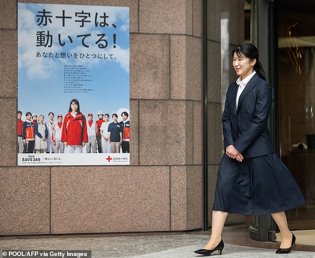 Aiko is depicted walking out of the Japanese Red Cross gate as she begins work