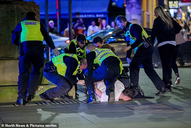 Police officers attack a man during a night out in Newcastle on Easter Sunday