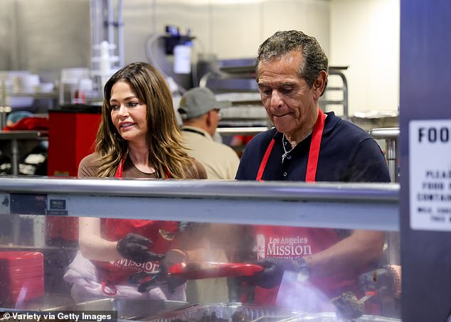 Denise and Antonio worked side by side for charity