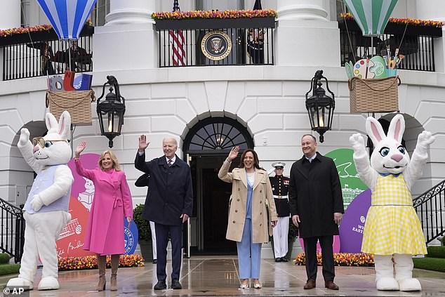 President Joe Biden, center left, and Vice President Kamala Harris, center right, joined by first lady Jill Biden, left, and second gentleman Doug Emhoff, right, wave at the White House Easter egg roll on the South Lawn