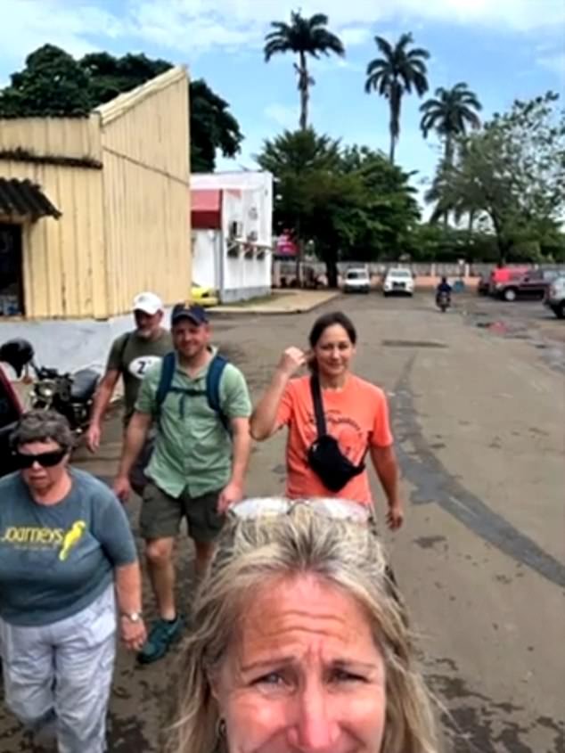 The group of stranded holidaymakers pose for a selfie amid their troubles in Africa