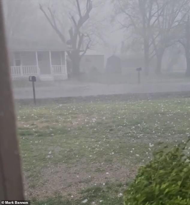 The hail was caught by a resident of Caney, Kansas, as large white chunks were thrown across a yard.  Heavy winds also caused the mix of rain and hail to drift through the air and roads