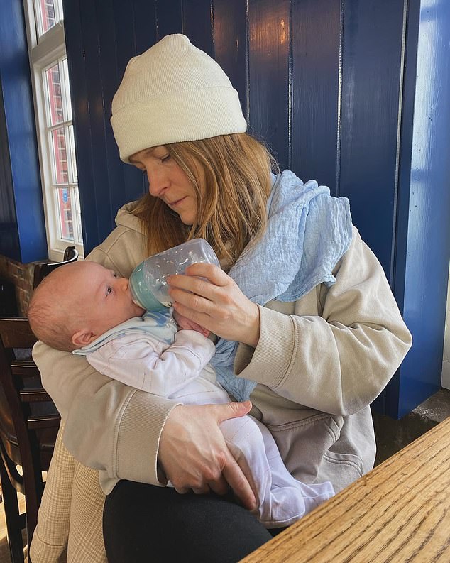 Elvis resembles his biological mother Kerry with his big eyes and button nose.  Ezra resembles his biological mother Emily with his tuft of red hair (above)