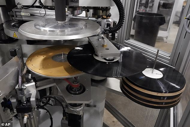 Vinyl records require a lot of energy to press into their molds.  If factories are not run efficiently, this can have high carbon costs