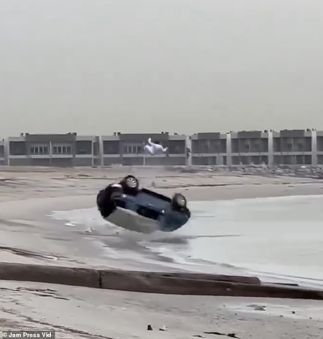 The man is thrown high into the air while the car continues to roll unstoppably