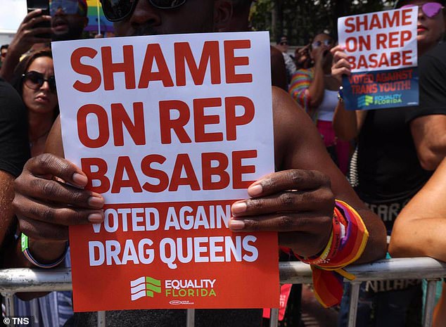 One protester held up a sign that read: “Shame on you that Red Basabe voted against Drag Queens.”