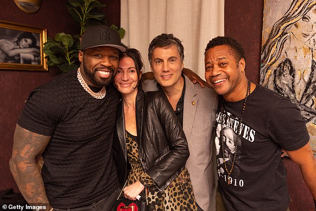 Basabe (second from left) pictured with 50 Cent and Cuba Gooding Jr.  at a birthday dinner for Cuba Gooding Jr.  hosted by 50 Cent at Sopra Miami on December 31, 2023 in Miami Beach