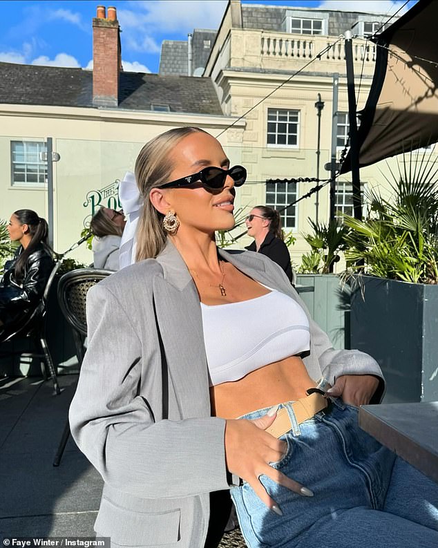 The Love Island star, 28, took to Instagram to show off her toned abs in the number which she paired with jeans and a stylish oversized gray blazer