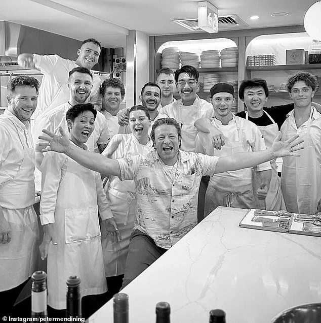 Jamie Oliver enjoyed a five-course fish meal at Petermen with a group of former Masterchef contestants and posed for photos with kitchen staff last November