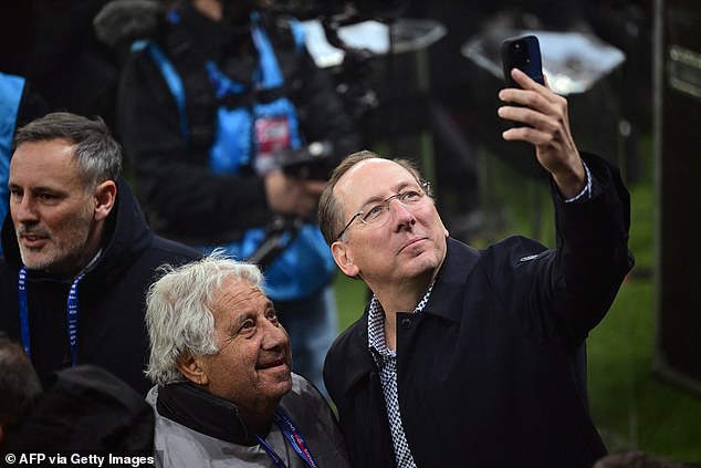 Club chairman John Textor (right) was also on the pitch, taking a selfie as he basked in the glory