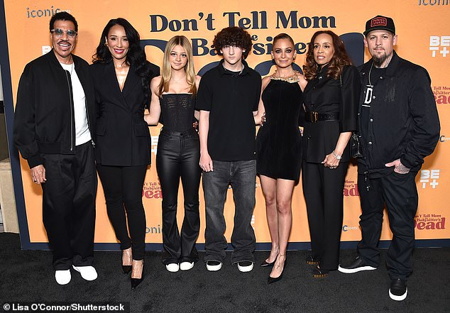 The whole family gathered together in the evening, while they were also joined by Nicole's husband Joe Madden (R) and their children Harlow, 16, and son Sparrow, 14 (center)