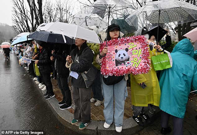Appalled fans were seen holding up banners and posters dedicated to the animal celebrity