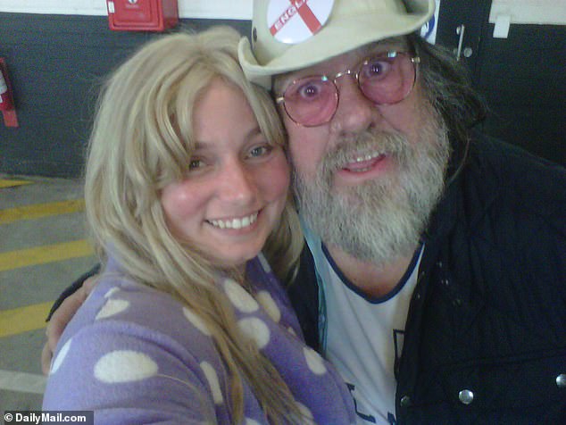 Le Roux is pictured with actor Ricky Tomlinson.  She tells DailyMail.com she was told to straddle a woman wearing nothing but underwear and a British flag