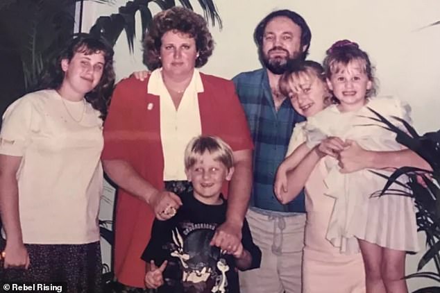 Rebel (left) remembered her father Warwick (third from right), who died in 2013 and had a violent outburst when she begged him to buy her a Slurpee as a 12-year-old