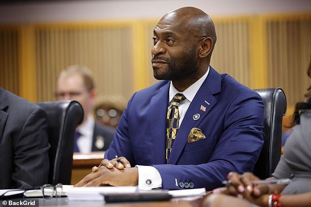 Willis' conduct was examined in sensational hearings, with a judge ruling that she could remain on the case as long as Wade recused himself.  Wade watches a hearing on Georgia election interference at the Fulton County Courthouse