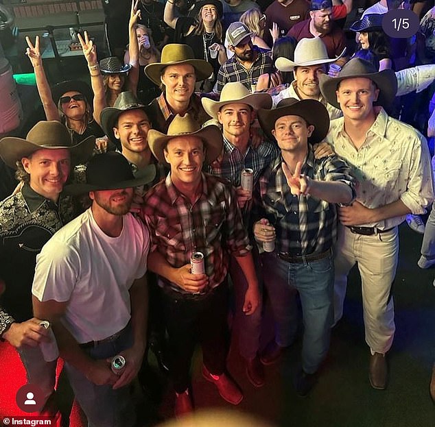 The group turned heads wearing cowboy hats at the Whiskey Row bar in Nashville, Tennessee