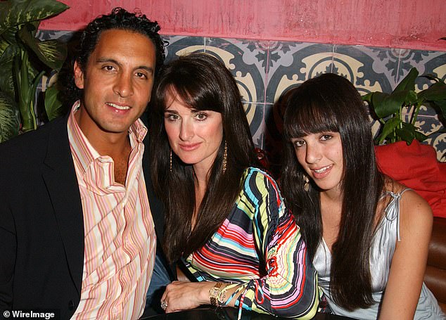 The Real Housewives of Beverly Hills star, 55, gave birth to Farrah, 35, when she was 19 years old before marrying Mauricio Umansky (seen with Kyle and Farrah in 2004)