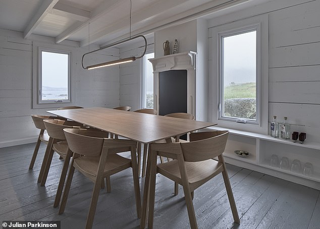 The kitchens in both houses are constructed of Baltic birch plywood and butcher block and the interiors are both clad primarily in white shiplap