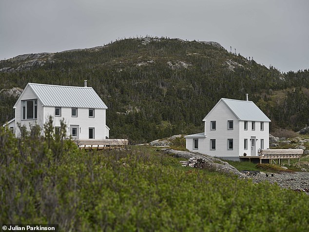 To maintain the appearance of the buildings, the architects added new white siding to mimic the original