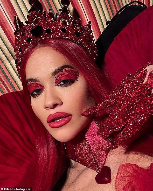 The 33-year-old singer and actress stunned in an over-the-top blood-red dress as part of her role as Queen of Hearts in the musical TV film Descendants: The Rise Of Red