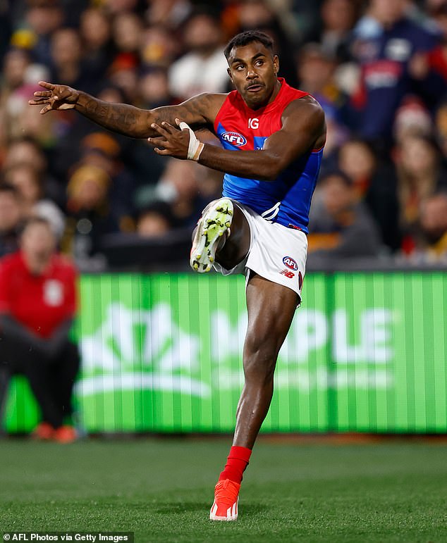 Melbourne star Kysaiah Pickett (pictured) could be in trouble after slamming his elbow into Jake Soligo's head while trying to smother a handball