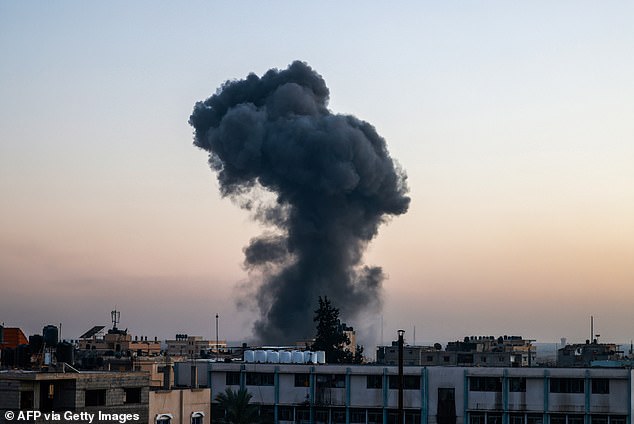 Smoke rises over buildings after an Israeli attack in Rafah, southern Gaza Strip, on April 4, 2024, amid the ongoing conflict between Israel and the Palestinian militant group Hamas