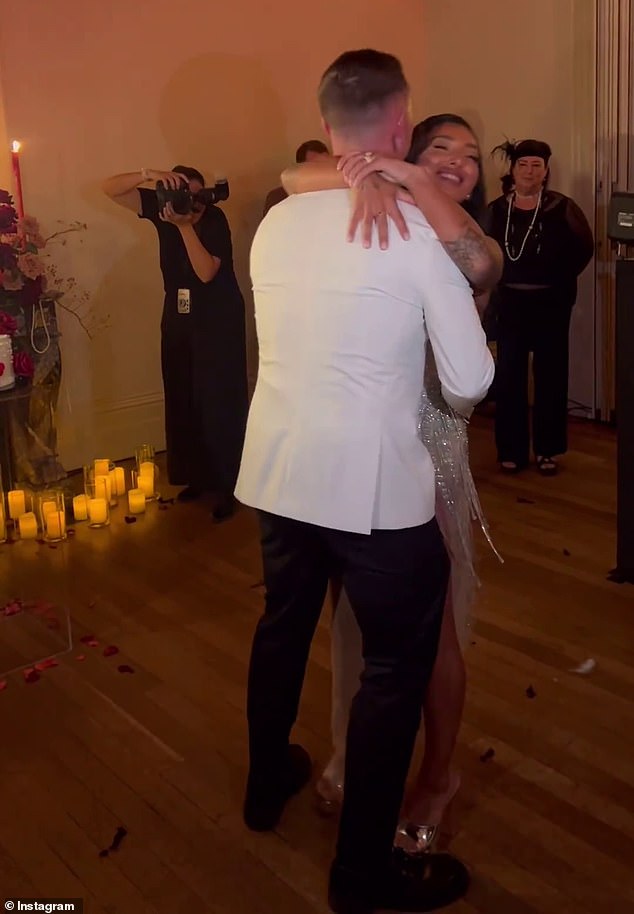 Adorable photos showed Ella and Guy performing their first dance while surrounded by their friends at the surprise ceremony