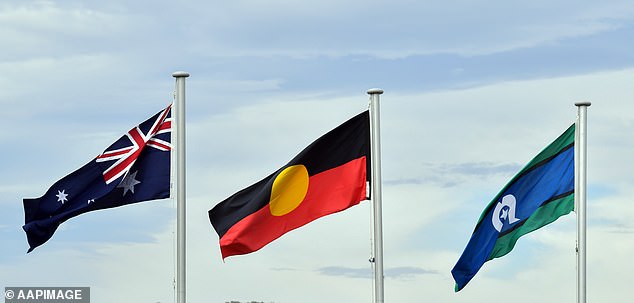 There is no official policy for the singing of the national anthem in South Australian schools (pictured: Australian, Aboriginal and Torres Strait Islander flags