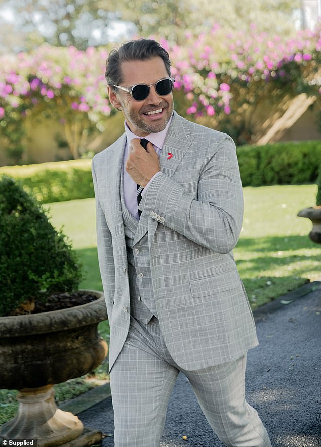 Actor Daniel, 43, looked suave in a gray three-piece suit with pinstripes, which he paired with a white shirt and a striped black tie