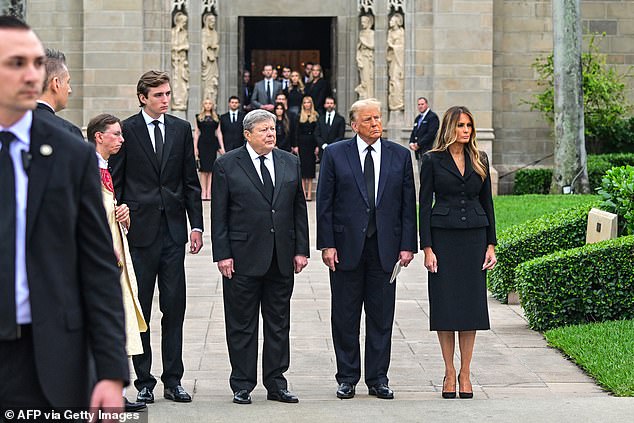 Barron Trump, Viktor Knavs, Donald Trump and Melania Trump at the funeral of Melania's mother Amalija Knavs in January