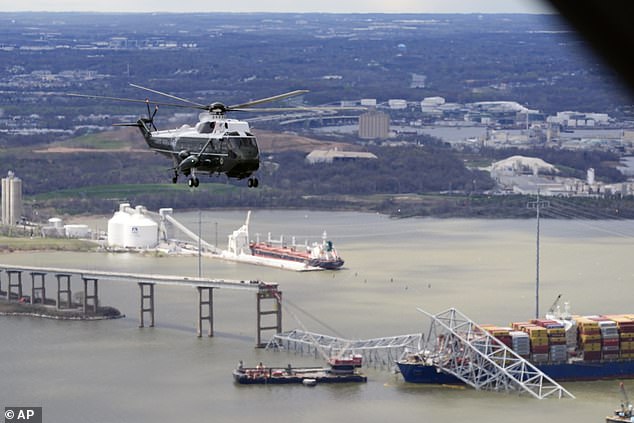 President Joe Biden flies over the wreckage of the Francis Scott Key Bridge in Marine One