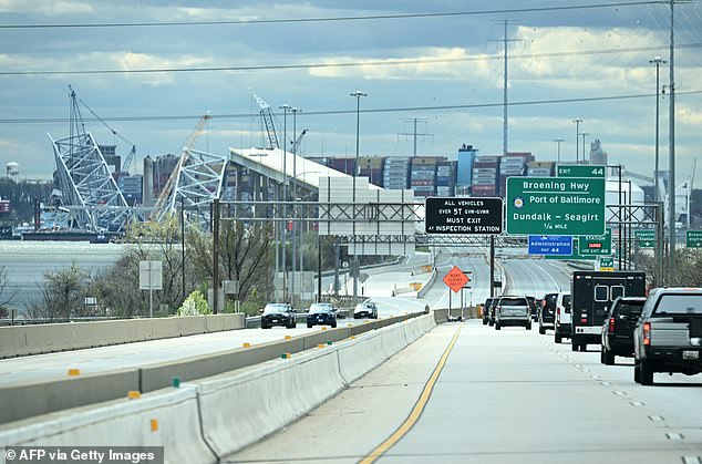 President Biden's motorcade moves past the collapsed Francis Scott Key Bridge