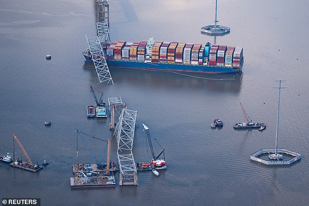 View of the Dali freighter that crashed into the Francis Scott Key Bridge in Baltimore, Maryland, USA on April 4.  President Joe Biden is expected to visit the site on Friday