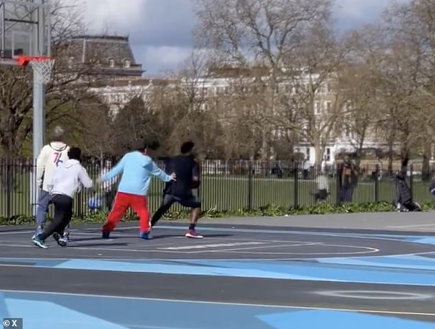 Adam opted for a relaxed look for the day, wearing a light blue hoodie and red tracksuit bottoms