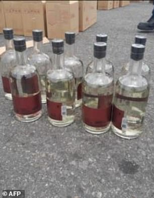 A huge shipment of liquid methamphetamine bound for Australia was found in a shipping container loaded with 7,200 bottles of clear liquid labeled alcohol mezcal (pictured)