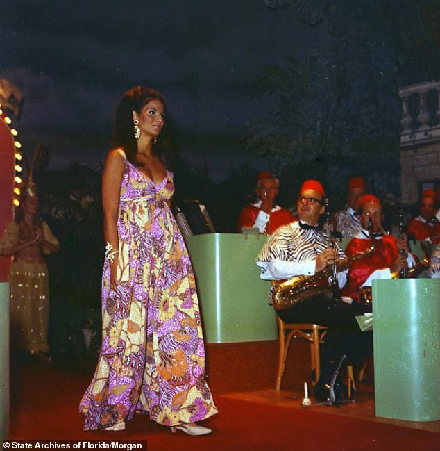 Mrs. J. Archie Peck in the fashion show at the Everglades Club for the St. Mary's Hospital ball