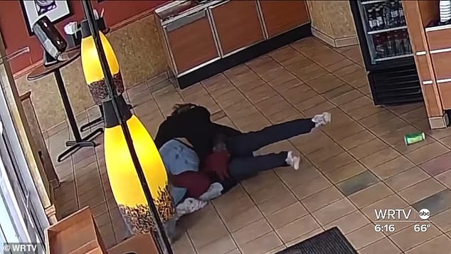 The incredible moment was captured on the store's surveillance camera, which shows the brave former high school wrestler attacking the attacker and successfully knocking him down.