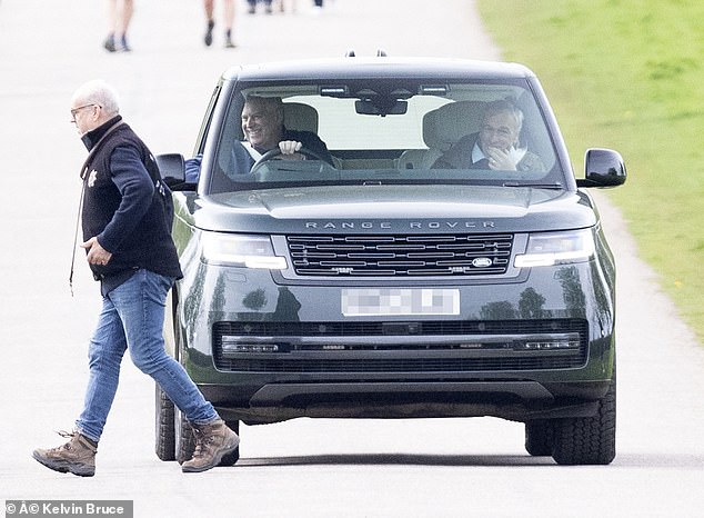 The cheeky dog ​​moves aside with his owner as Andrew grins