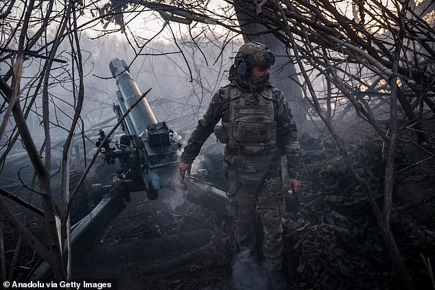 Ukrainian soldiers fire an artillery towards Siversk, Donetsk Oblast, Ukraine.  As soon as the gas hits, even if it is not fatal, the troops panic and 'the first instinct is to get out'