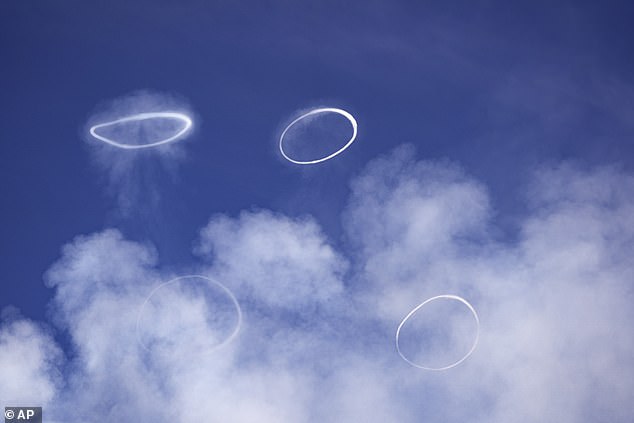 The rare phenomenon – known as volcanic smoke rings – can only form in a circular volcanic vent and requires a calm atmosphere