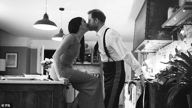 In this photo, taken in the kitchen of their Frogmore Cottage home, there appears to be a lazy tap sitting on the hob